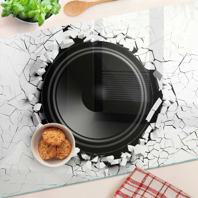 Tabla de cortar de cristal Orador en una pared rota