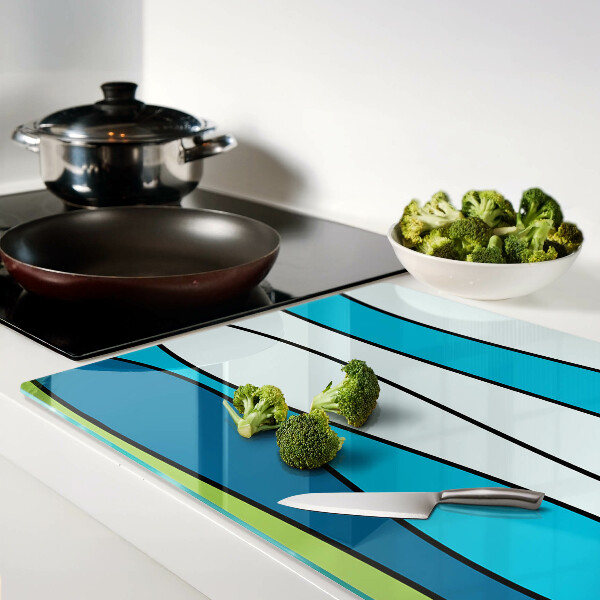 Tabla para cortar Ondas en tonos azules y verdes.