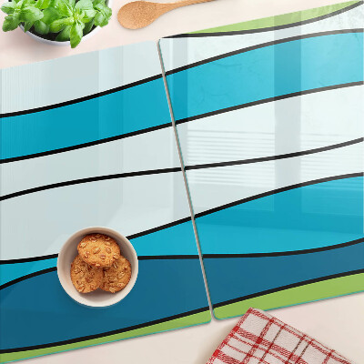 Tabla para cortar Ondas en tonos azules y verdes.