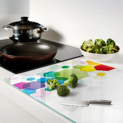 Tabla de cortar Hexágonos coloridos en el fondo.