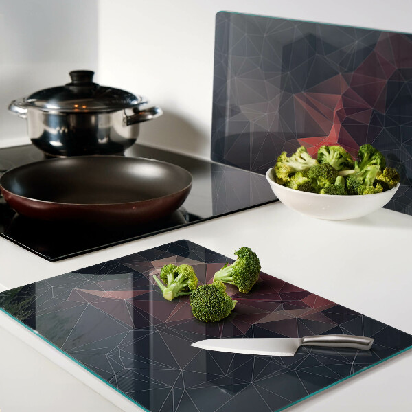 Tabla de cortar de cristal Geometría abstracta en tonos rojos.