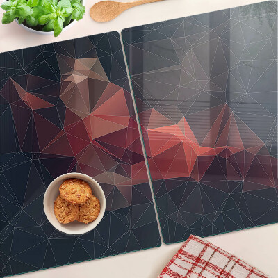 Tabla de cortar de cristal Geometría abstracta en tonos rojos.