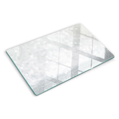 Tabla de cortar de cristal Bokeh brillante con efecto de luz