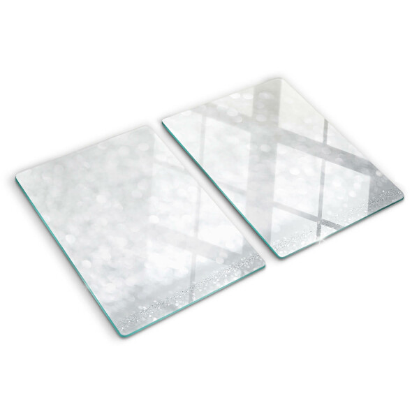 Tabla de cortar de cristal Bokeh brillante con efecto de luz