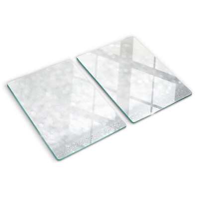 Tabla de cortar de cristal Bokeh brillante con efecto de luz