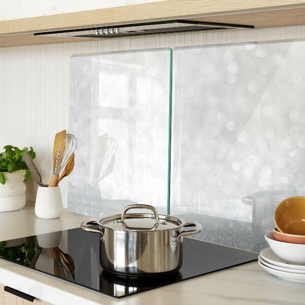 Tabla de cortar de cristal Bokeh brillante con efecto de luz