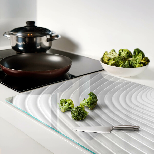 Tabla de cortar de cristal Ondas y líneas en tonos de gris.