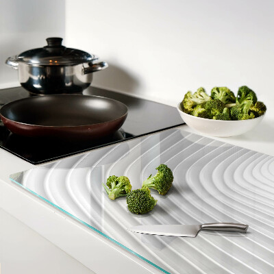 Tabla de cortar de cristal Ondas y líneas en tonos de gris.