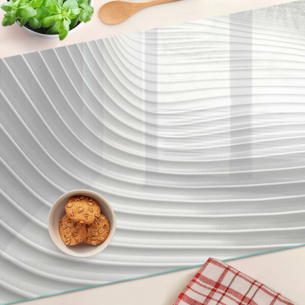 Tabla de cortar de cristal Ondas y líneas en tonos de gris.