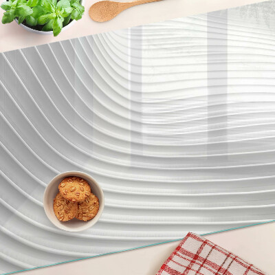 Tabla de cortar de cristal Ondas y líneas en tonos de gris.