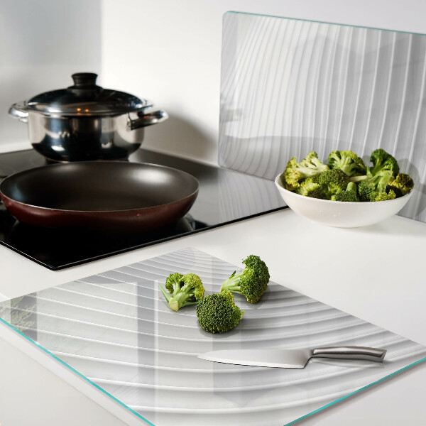 Tabla de cortar de cristal Ondas y líneas en tonos de gris.