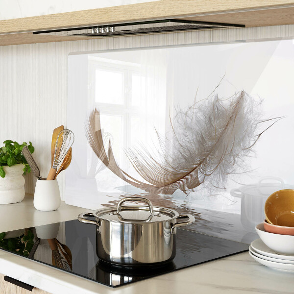 Deska kuchenna szklana Pióro na tle wody