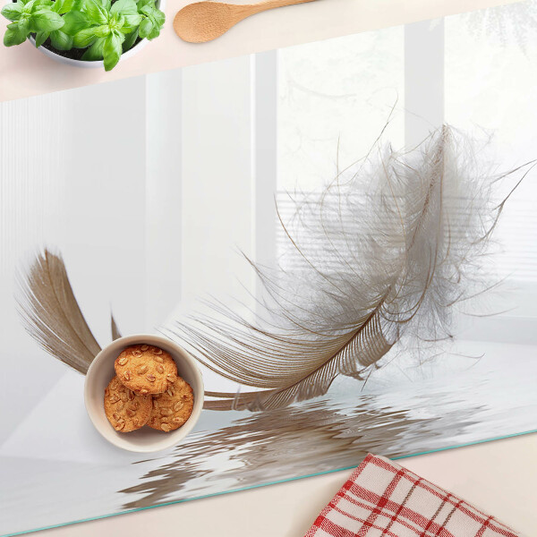 Tabla de cortar Una pluma contra el agua