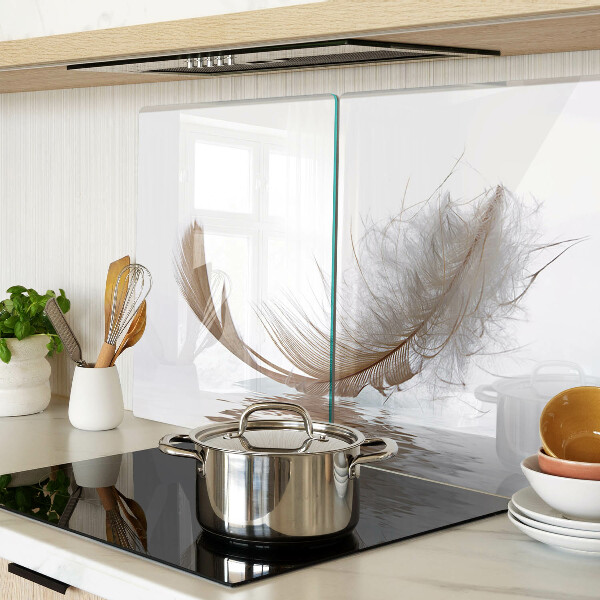 Deska kuchenna szklana Pióro na tle wody