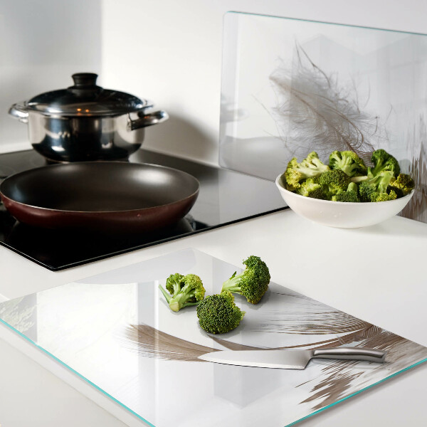 Deska kuchenna szklana Pióro na tle wody