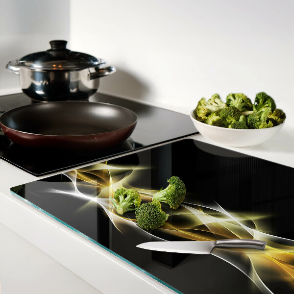 Tabla de cortar Una ola de luz en tonos dorados.