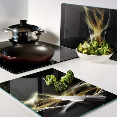 Tabla de cortar Una ola de luz en tonos dorados.