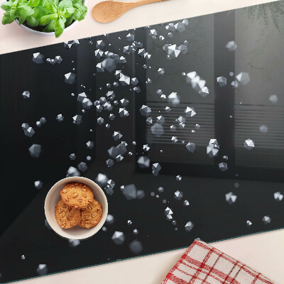 Tabla de cortar de cristal Burbujas de cristal sobre un fondo negro