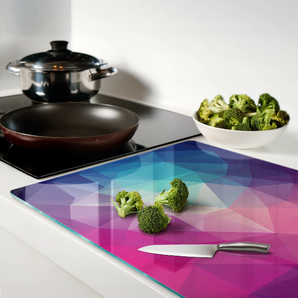 Tabla para cortar Geometría en tonos rosa y azul.