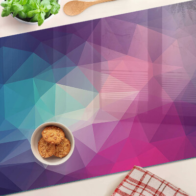 Tabla para cortar Geometría en tonos rosa y azul.