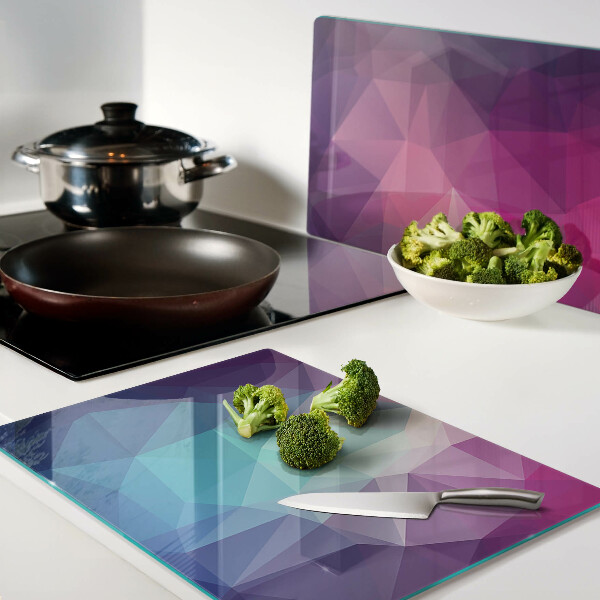 Tabla para cortar Geometría en tonos rosa y azul.