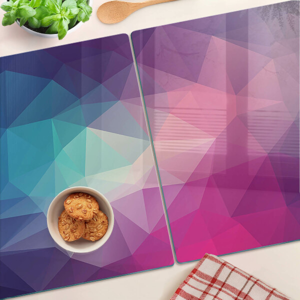 Tabla para cortar Geometría en tonos rosa y azul.