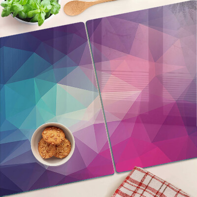 Tabla para cortar Geometría en tonos rosa y azul.