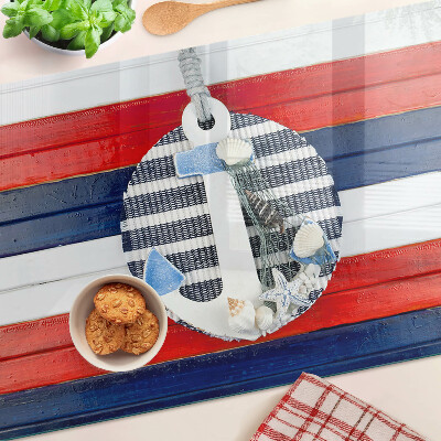 Tabla para cortar Ancla sobre fondo de rayas