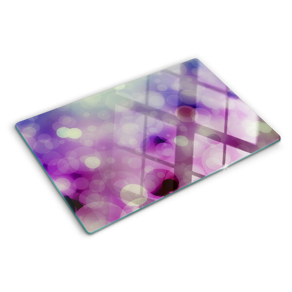 Tabla de cortar Bokeh en tonos morados y rosas