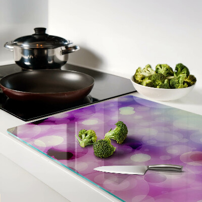 Tabla de cortar Bokeh en tonos morados y rosas