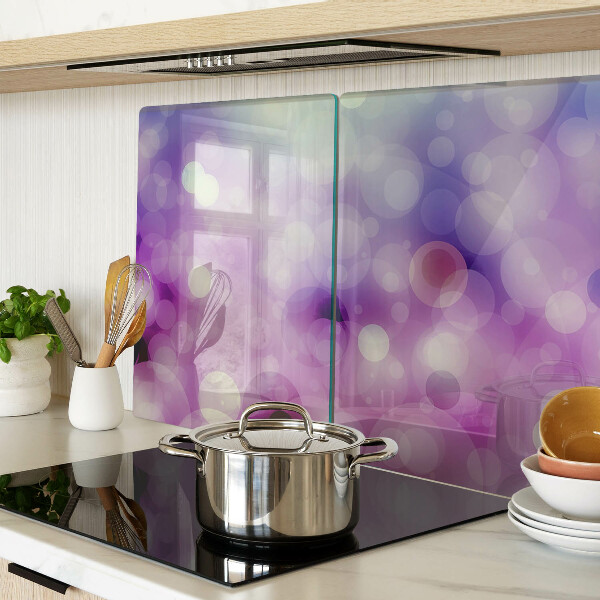 Tabla de cortar Bokeh en tonos morados y rosas