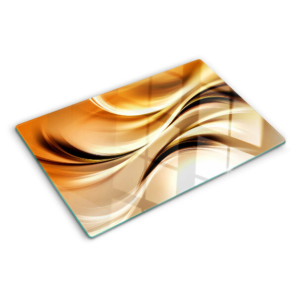 Tabla de cortar de cristal Ondas abstractas en tonos dorados