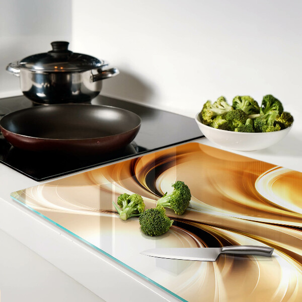 Szklana deska kuchenna Abstrakcyjne fale w odcieniach złota