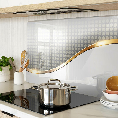 Tabla de cortar de cristal Una ola dorada sobre un fondo de puntos.