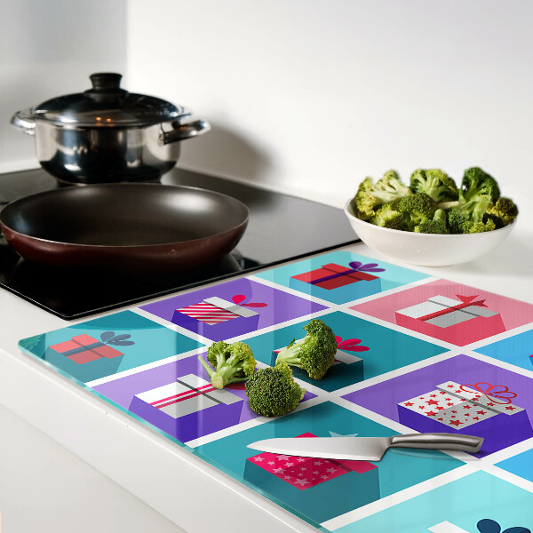 Tabla para cortar Motivos de regalo en varios colores.