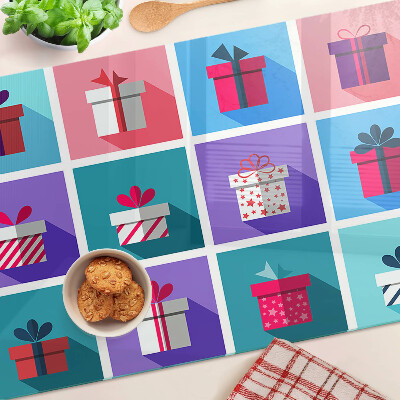 Tabla para cortar Motivos de regalo en varios colores.