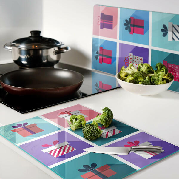 Tabla para cortar Motivos de regalo en varios colores.