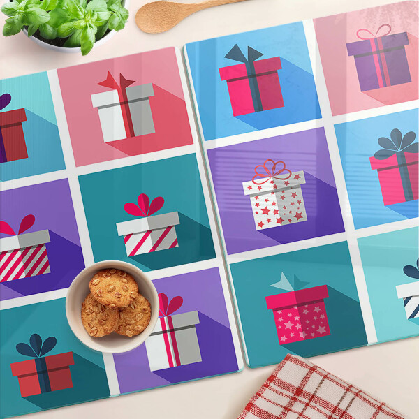 Tabla para cortar Motivos de regalo en varios colores.