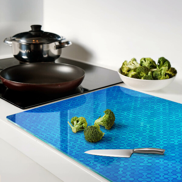 Tabla para cortar Un patrón ondulado en tonos azules.