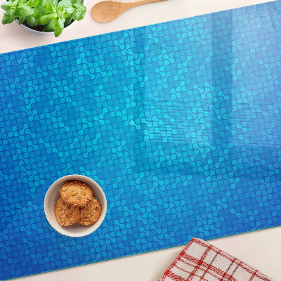 Tabla para cortar Un patrón ondulado en tonos azules.