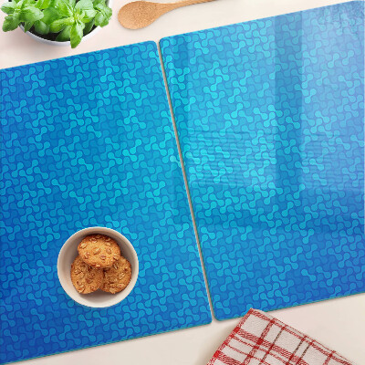 Tabla para cortar Un patrón ondulado en tonos azules.