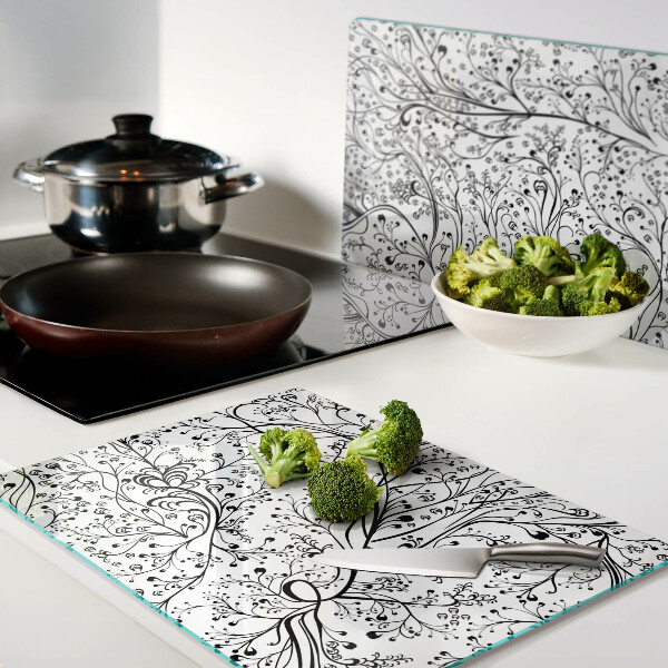 Tabla de cocina Un patrón de planta con ramas delicadas.