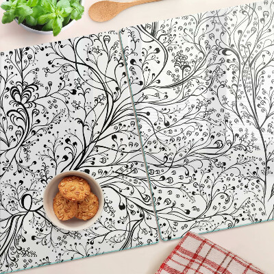 Tabla de cocina Un patrón de planta con ramas delicadas.