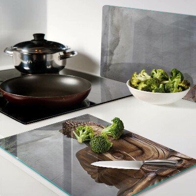 Tabla para cortar Buda en meditación