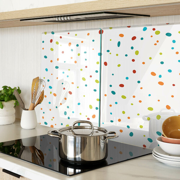Tabla de cocina Puntos de colores sobre un fondo blanco