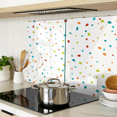 Tabla de cocina Puntos de colores sobre un fondo blanco