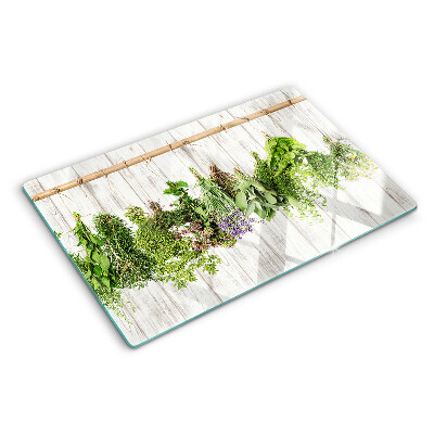 Tabla de cocina Hierbas sobre un fondo de madera