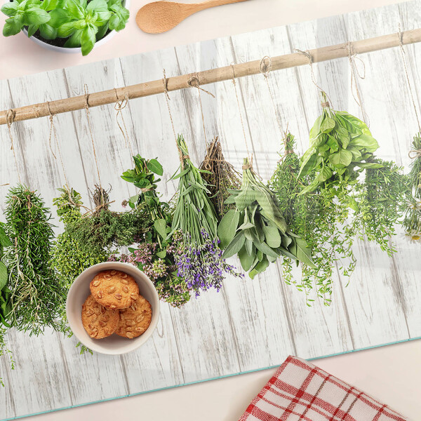 Tabla de cocina Hierbas sobre un fondo de madera