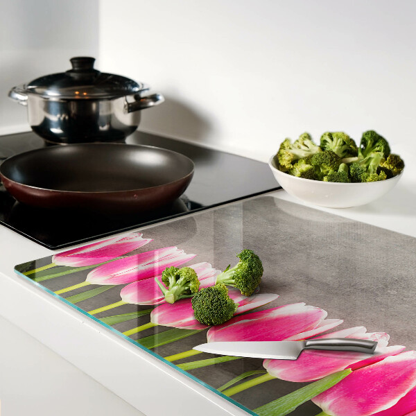 Tabla para cortar Tulipanes sobre un fondo gris