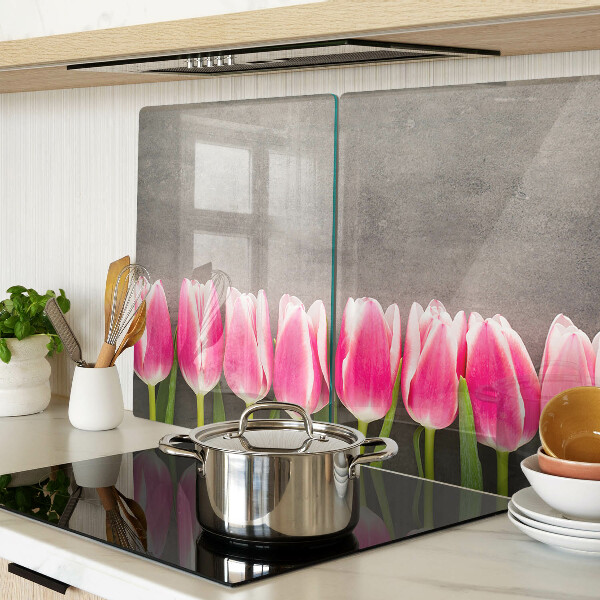 Tabla para cortar Tulipanes sobre un fondo gris